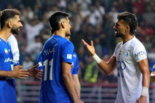 اثر ضربه رامین رضاییان روی بازیکن استقلال خوزستان موند! +عکس